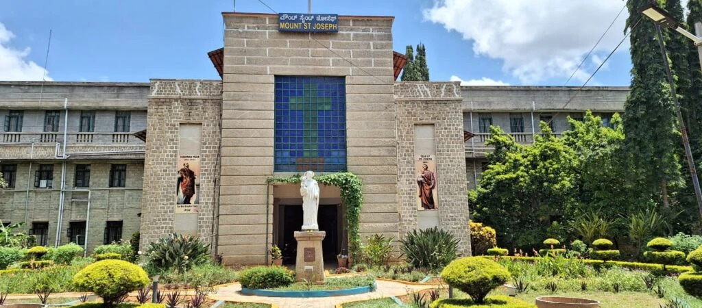 A wide view of Mount St Joseph and the landscaped garden in front.